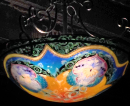 One of the hanging glass lamps.