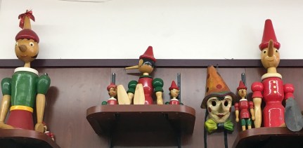 yPinocchio's dols on shelves